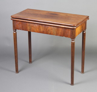 A 19th Century Continental card table fitted 1 long drawer, the back raised on turned supports 72cm h x 80cm w x 39cm d 