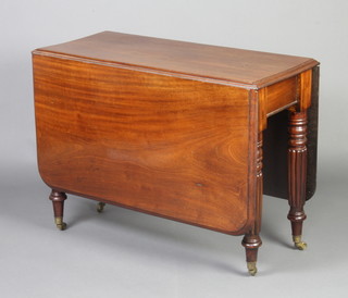 A 19th Century mahogany drop flap gateleg dining table, raised on 6 turned and reeded supports ending in brass caps and casters 72cm h x 95cm w x 44cm when closed x 144cm when extended 