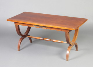 An Empire style mahogany rectangular coffee table with gilt metal mounts, raised on X framed supports with H framed stretcher 45cm h x 95cm w x 45cm d 
