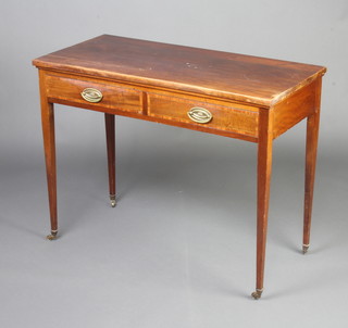 An Edwardian inlaid mahogany side table fitted 2 drawers, raised on square tapered supports with casters 78cm h x 102cm w x 48cm d 
