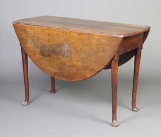 A Georgian mahogany oval padfoot dining table 72cm h x 111cm w x 48cm l when closed x 113cm l when open 
