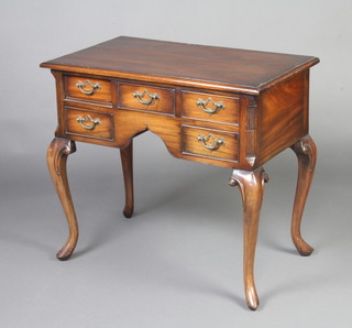 A Georgian style mahogany low boy fitted an arrangement of 5 drawers with brass plate drop handles, raised on cabriole supports 65cm h x 73cm w x 43cm d 
