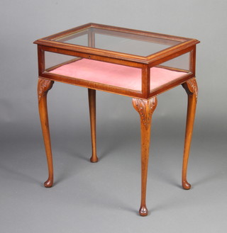 An Edwardian style rectangular inlaid mahogany bijouterie table raised on carved cabriole supports 74cm h x 64cm w x 44cm d 