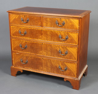 A Georgian style crossbanded mahogany chest of 2 short and 3 long drawers with swan neck drop handles, raised on bracket feet 95cm h x 102cm w x 50cm d 