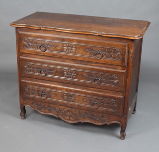 A Continental oak chest of 3 long carved drawers with iron ring drop handles 90cm h x 110cm w x 54cm d 