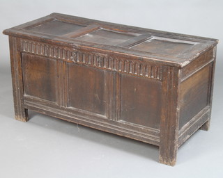 A 17th/18th Century oak coffer of panelled construction with arcaded decoration and hinged lid 61cm h x 123cm w x 54cm d 