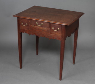 An 18th Century oak lowboy fitted 3 drawers raised on square tapered supports 73cm h x 73cm w x 52cm d  