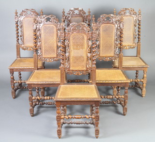 A set of 6 Victorian carved oak Carolean style high back dining chairs with woven cane seats and backs 