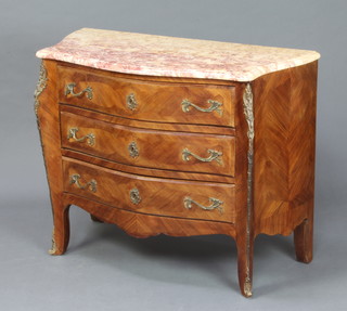 A French Kingwood commode of serpentine outline with pink veined marble top, fitted 3 long drawer ending in gilt metal mounts throughout 82cm h x 102cm w x 48cm d 