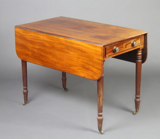 A 19th Century mahogany Pembroke table fitted a drawer, raised on turned supports with brass caps and casters 70cm h x 96cm w x 56cm d 
