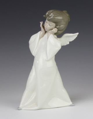 A Lladro figure of an angel 22cm 