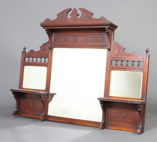 A Victorian triple plate over mantel mirror contained in a carved walnut frame with broken pediment and bobbin turned decoration 117cm h x 146cm w x 17cm d 