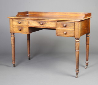 A Victorian mahogany dressing table with 3/4 gallery, fitted 1 long and 3 short drawers with tore handle, raised on turned supports 82cm h x 111cm w x 52cm d  
