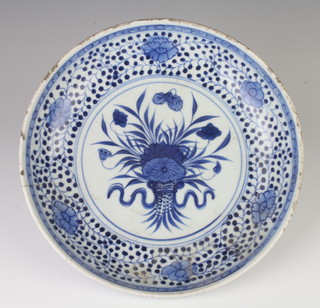 A 19th Century Chinese shallow dish decorated with flowers 26cm 