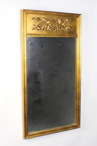 A 19th Century style rectangular plate pier mirror contained in a decorative gilt frame 105cm h x 56cm w