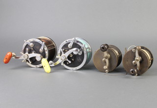 Two Penn 49 deep sea fishing reels, 1 with narrow drum, 1 with wide drum and 2 1930's Brother multiplier fishing reels 