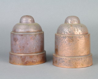 A pair of domed copper jelly moulds marked 516, 14cm x 11cm diam. 