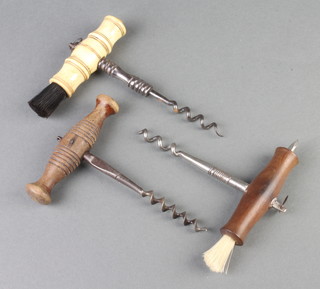 A polished steel corkscrew with turned bone handle and brush, a 19th Century polished steel and turned wood corkscrew with spike and brush, 1 other corkscrew 
