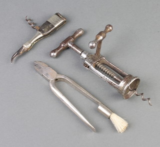 A 19th Century steel champagne wire cutter, the end fitted a brush, a 19th Century steel ratchet corkscrew, a novelty folding champagne/bottle opener in the form of a champagne cork fitted with 2 blades and a corkscrew with horn grip marked champagne Dalizon and Fils Chalons/Marne (crack to the horn grip) 