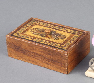 A 19th Century rectangular Tunbridge Ware box the lid with floral and geometric decoration 3cm x 9cm x 6cm (some sections missing) 