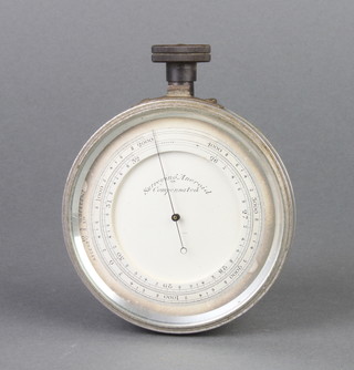A surveying aneroid barometer with silvered dial marked Surveying Aneroid Compensated 8cm 