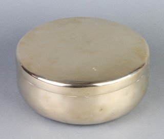 A Korean circular gilt metal jar and cover 9cm x 21cm 