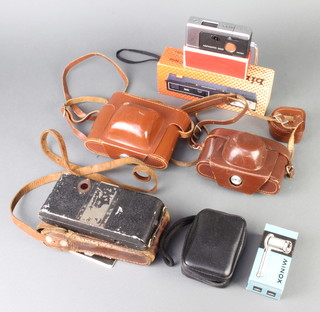 A 1930's Glunz German folding camera, a Rollei folding camera, a Rollei standard 35mm camera, a West German King Regular CITA III 35mm camera, an Agfa Isola 1 camera, an Agfa 2000 and other cameras 
 
