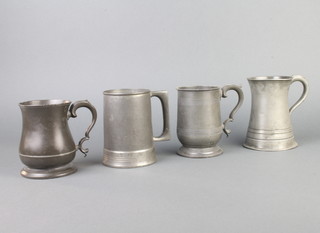 A 19th Century Imperial pewter pint tankard of waisted form, a pewter tankard by James Yates and 2 other pewter tankards one with glass bottom set 3 dice by Cogent  