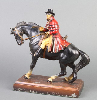 A 1930's cold painted spelter table lighter in the form of a highwayman 24cm h x 19cm w x 9.5cm  