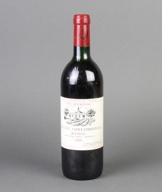 A bottle of 1985 Chateau Saint-Christoly Medoc (wine just on the shoulder)