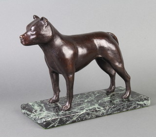 A bronze figure of a standing Staffordshire Bull Terrier, raised on a rectangular marble base 20cm h x 28cm w x 12cm d 
