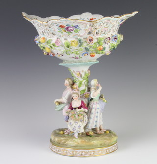A 19th Century Potschappel centrepiece, the pierced basket encrusted with flowers, the base with 4 figures, 30cm 