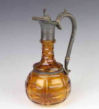 A Continental 19th Century faceted amber glass ewer with plated metal mounts 29cm 
