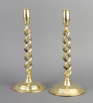 A pair of Victorian brass spiral turned candlesticks 30cm 