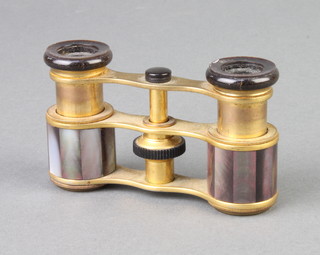 A pair of gilt metal and mother of pearl opera glasses
