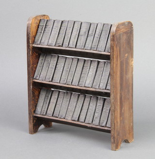 Allied Newspapers Ltd.  A set of 35 miniature editions "The Works of William Shakespeare" contained in an oak 3 tier bookcase 22cm h x 19cm w x 7cm 

