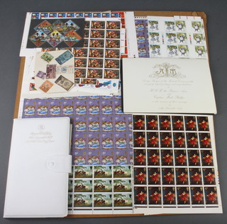A sheet of Elizabeth II 1/6d Christmas stamps, a sheet of Elizabeth II 4d Christmas stamps, a sheet of ditto 5d stamps, a sheet of 5d stamps, various part sheets of stamps, a 1973 Royal Wedding first day cover with sterling proof crown 