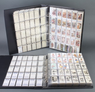 Two albums of Wills and Players cigarette cards including Allied Army Leaders, Overseas Dominions, History of Naval dress, Gems of Russian Architecture, Gems of Belgium Architecture, Characters from Dickens etc 