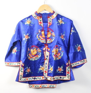 A lady's Chinese embroidered garter blue silk jacket and trousers 