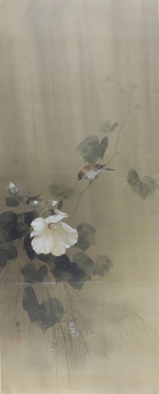 A Japanese painted silk scroll decorated with a bird amongst flowers, signed, framed 132cm x 49cm 