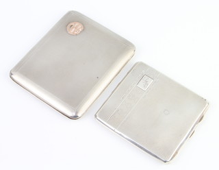 A silver engine turned patent opening cigarette case Birmingham 1925  by Adie Bros and a smaller ditto, 284 grams gross 