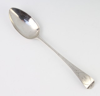 A William IV silver table spoon with bright cut decoration London 1834, 53 grams 
