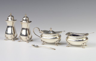A silver 4 piece condiment with gadrooned rims on pad feet Birmingham 1947, 200 grams 