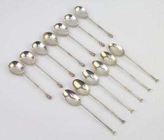 A set of silver teaspoons with fancy terminals, Sheffield 1960 and a similar set Sheffield 1924, 140 grams