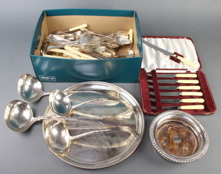 A circular silver plated tray with gadrooned rim 31cm, a cased set and minor plated wares 
