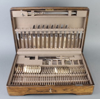 A canteen of silver plated cutlery for 8 (63) contained in an oak canteen