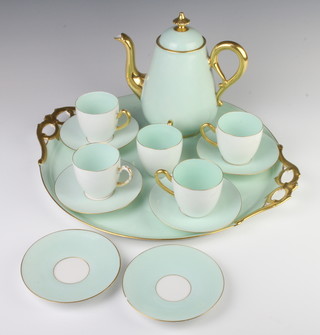 An Edwardian pale turquoise and gilt decorated cabaret set comprising 2 handled tray, 5 coffee cups and 6 saucers together with a coffee pot 