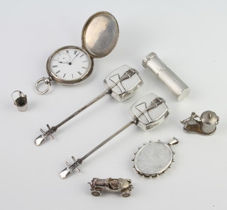 A silver charm in the form of a vintage car and driver, 2 Japanese musical instruments and minor silver items 