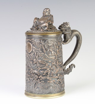 A Victorian Chinese silver plated tankard decorated with an extensive scene of figures hunting deer, the finial in the form of a seated gentleman with dragon handle and engraved plaque - Ragland Archers August 26th 1868 with crest, 16.5cm 