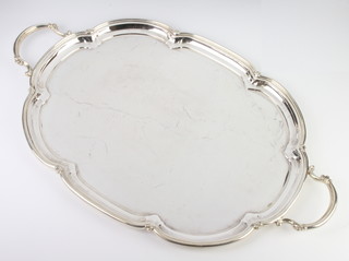 A scalloped 2 handled silver tray, London 1926, maker Sebastian Henry Garrard, 65cm, 2722 grams